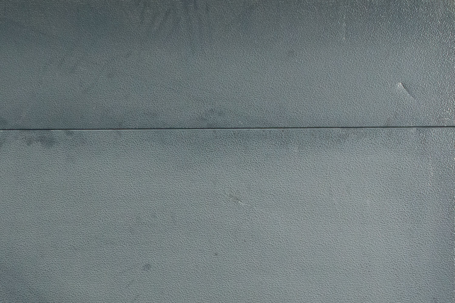 Hoe kan ik mijn garagedeur schoonmaken?